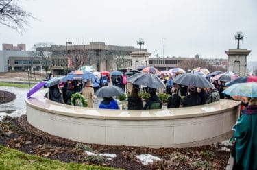 Mourners gather at the Place of Remembrance